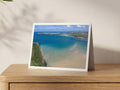 Premium A5 greeting card showing the Camel Estuary shallows at low tide with Polzeath across the water