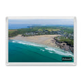 Polzeath fridge magnet showing the bay at peak low tide with a wide sweep of sand and colourful water in spring sunshine