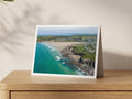 Premium A5 greeting card showing low-tide rocks and turquoise water beside Polzeath beach