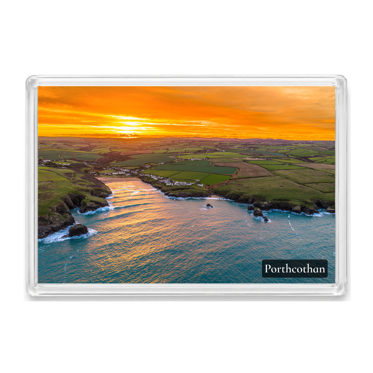 Porthcothan Bay at sunrise, shown as a clear acrylic fridge magnet