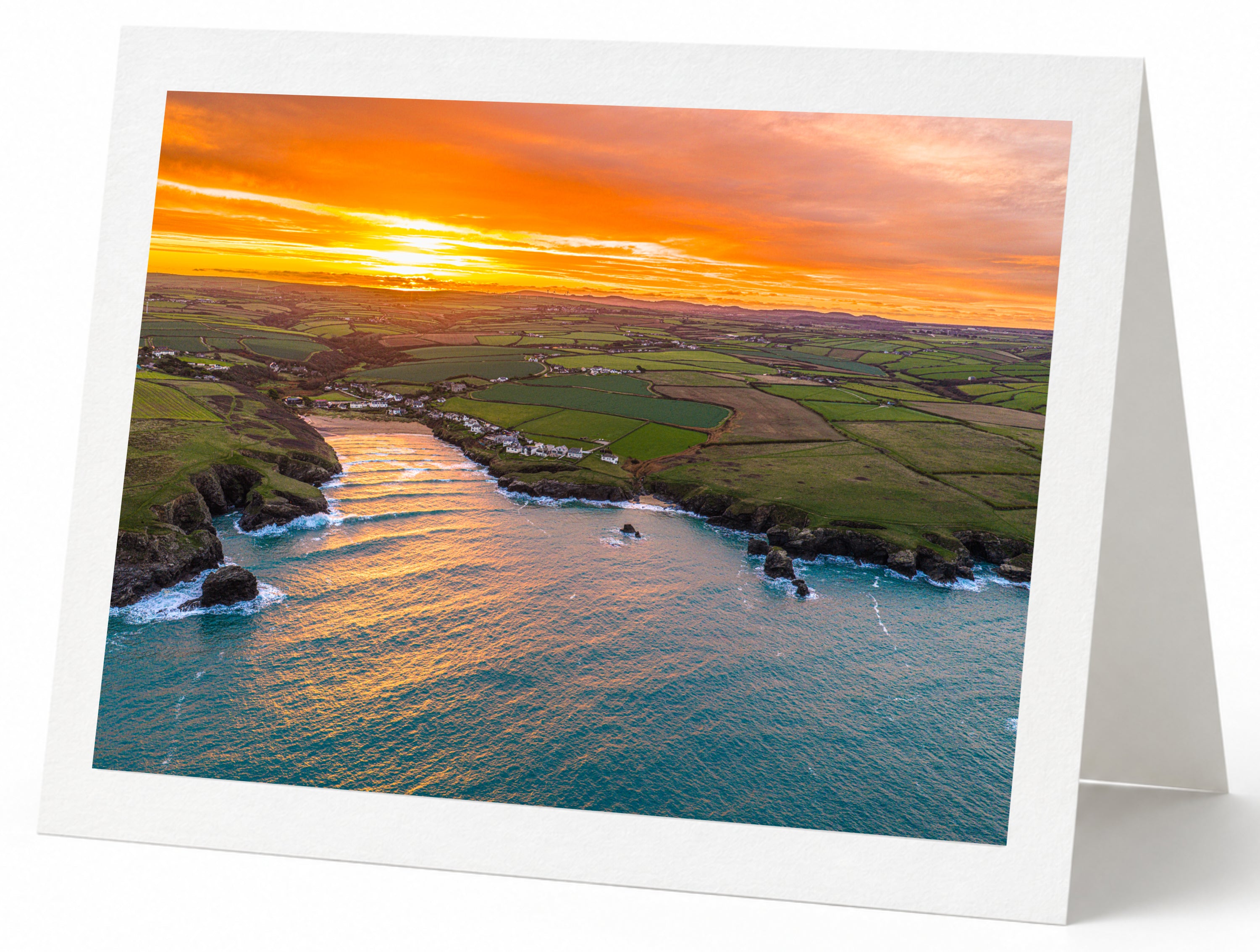 Premium A5 greeting card showing an autumn sunrise over Porthcothan Bay, Cornwall