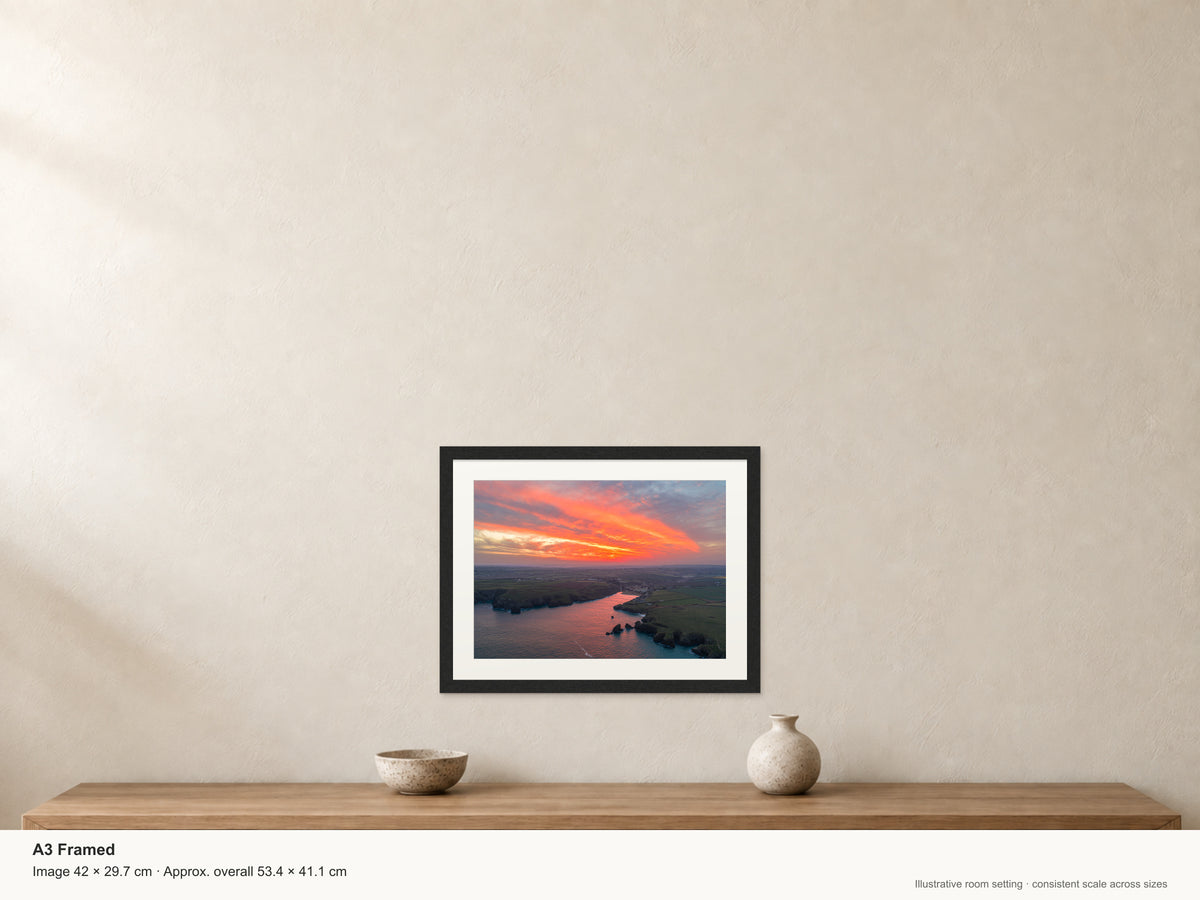 Porthcothan Bay — Inferno Sunrise Reflection — A3 framed, 22mm black stained frame and 35mm mount. Illustrative room scale and dimensions.