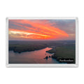 Porthcothan Bay fridge magnet showing a red and orange sunrise reflected in the calm high-tide water of the bay