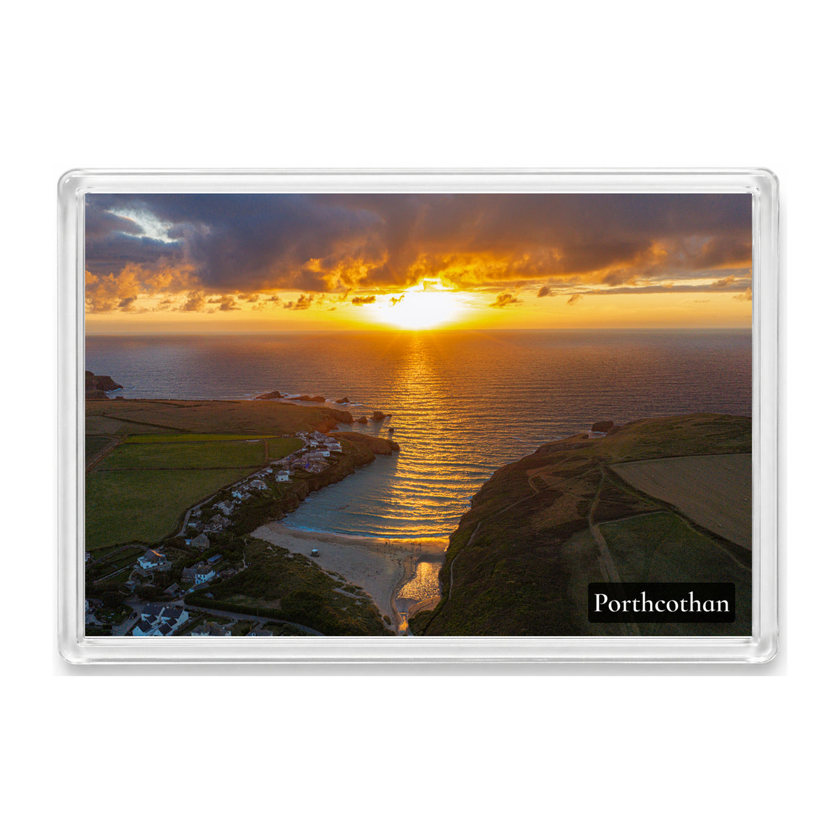 Porthcothan fridge magnet showing golden sunset light across the water and tidal stream with the beach, village and headlands below