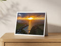 Premium A5 greeting card showing golden sunset light over Porthcothan beach and village