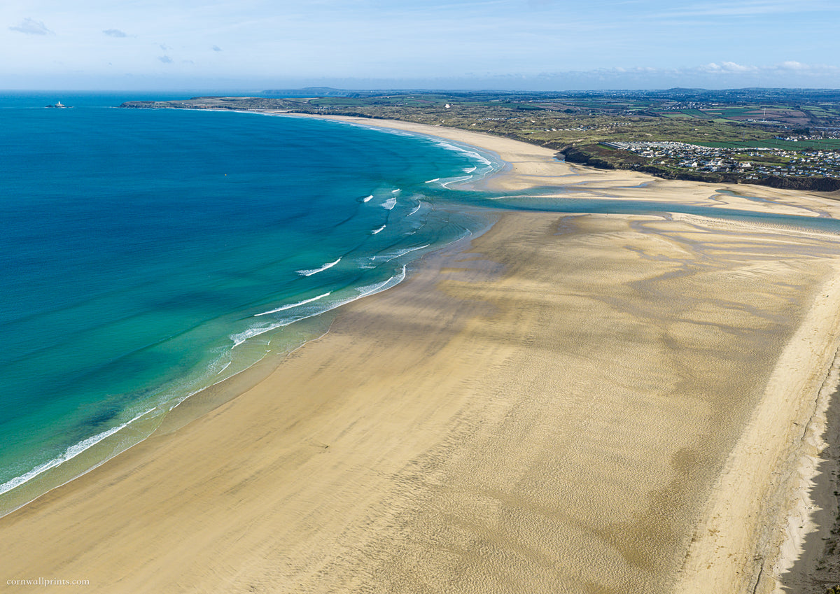Porthkidney Sands at mid-to-low tide, looking across Hayle Estuary mouth along the expansive beaches to distant Godrevy Lighthouse