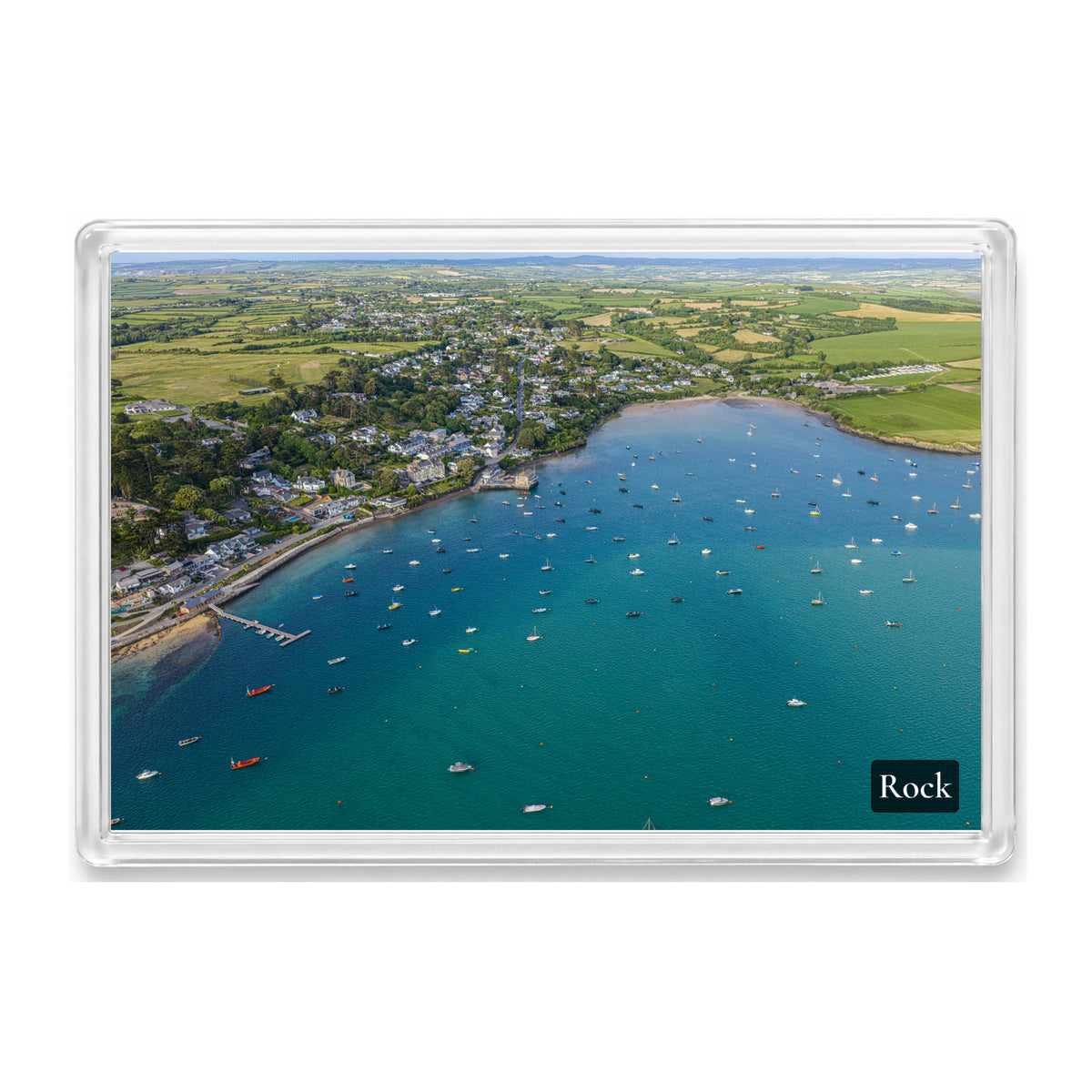 Rock and boats on the Camel Estuary, shown as a fridge magnet