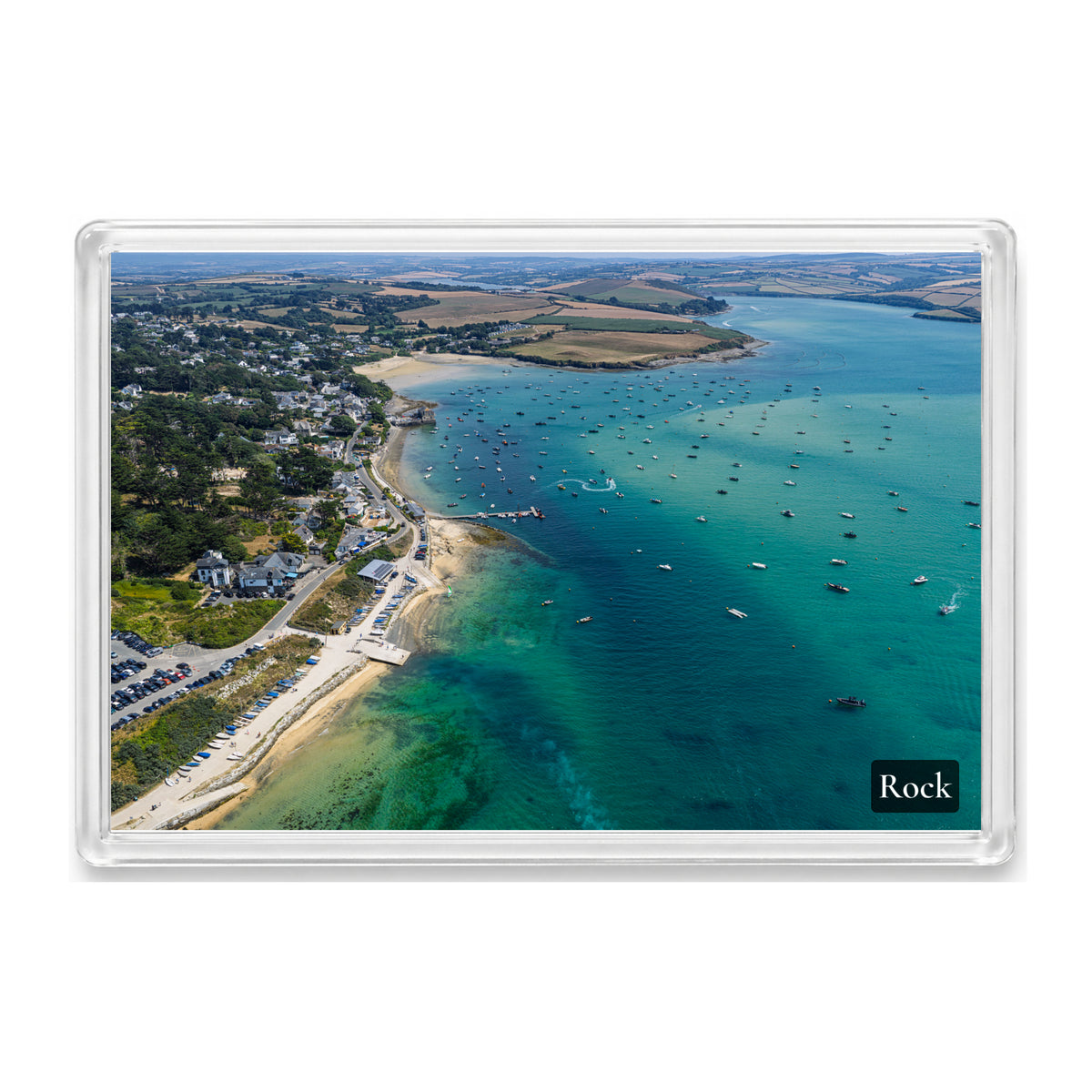 Rock fridge magnet showing the Camel Estuary at high tide with blue water and boats scattered across the bay