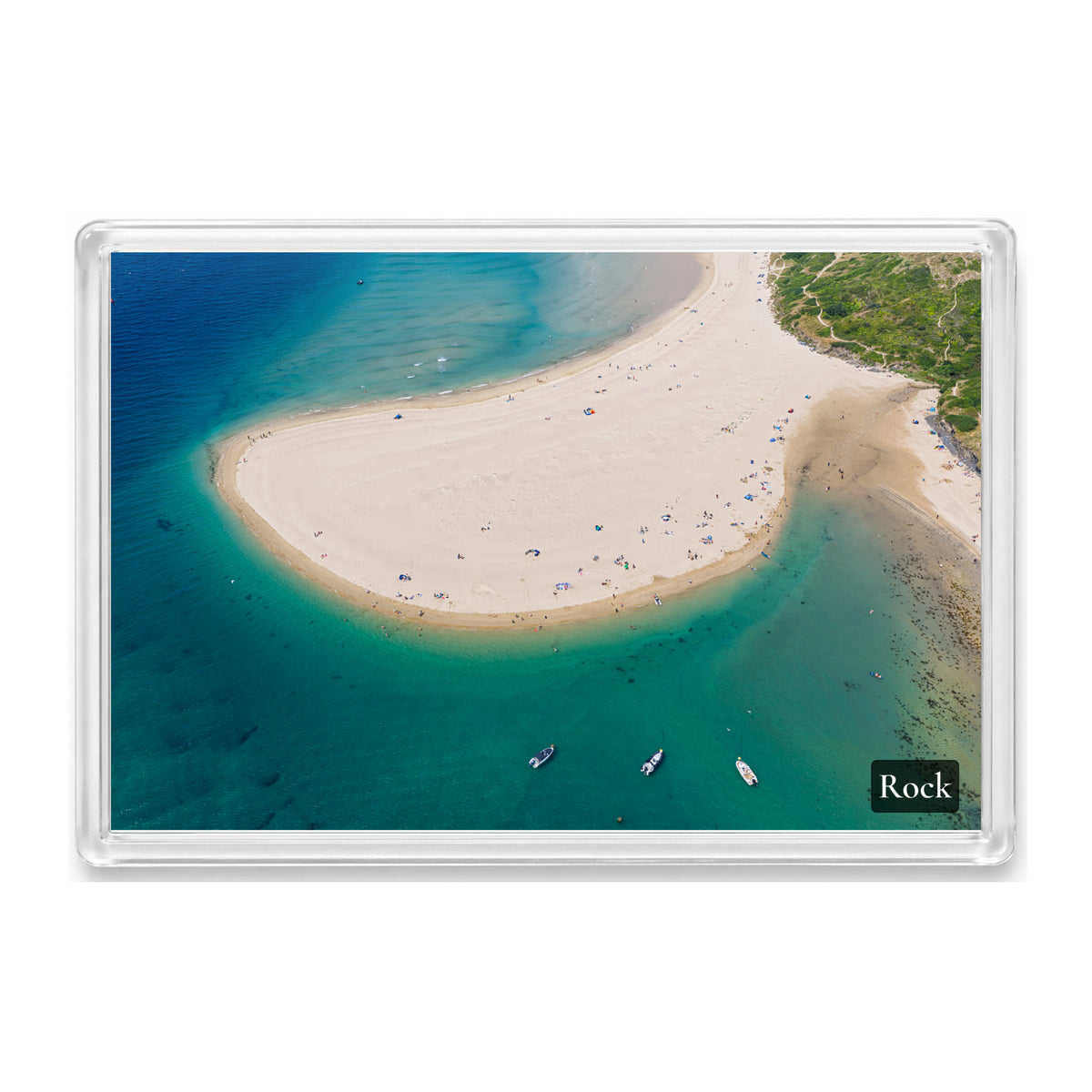 Rock fridge magnet showing the low-tide sand spit in turquoise and teal water with swimmers, small boats and Brea Beach