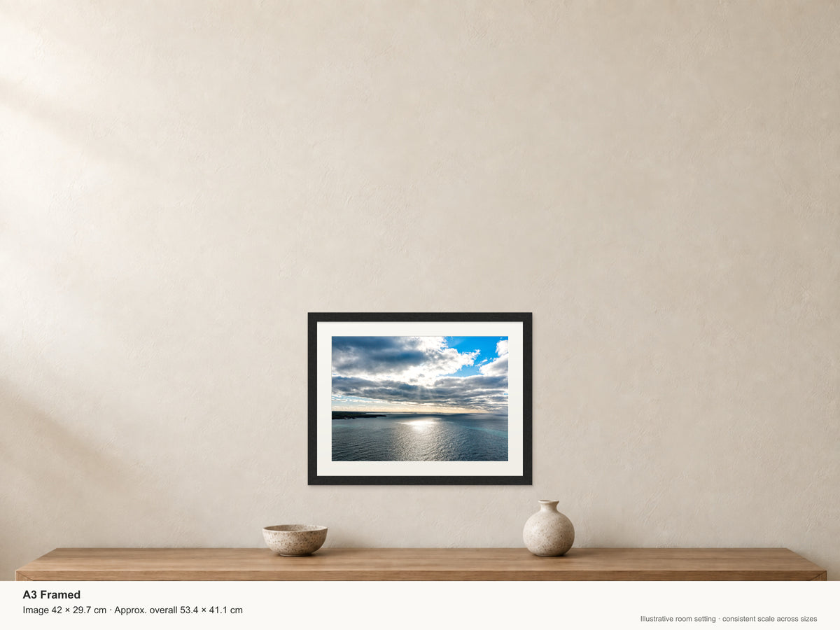 Sunbreak on the Atlantic — Porthcothan to Newquay — A3 framed, 22mm black stained frame and 35mm mount. Illustrative room view and dimensions.