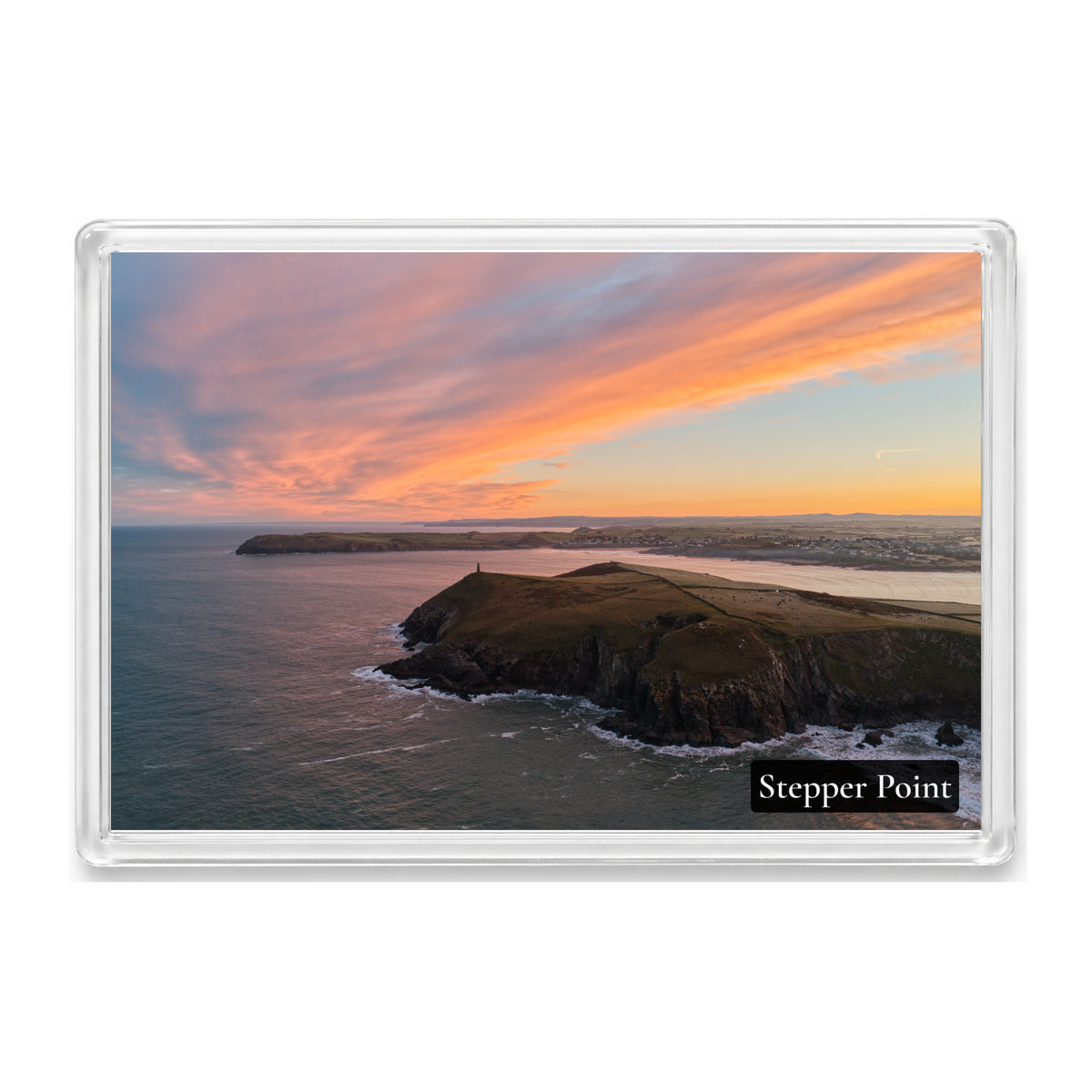 Stepper Point fridge magnet showing the Daymark against a red-and-yellow sunrise with Pentire Point in the distance