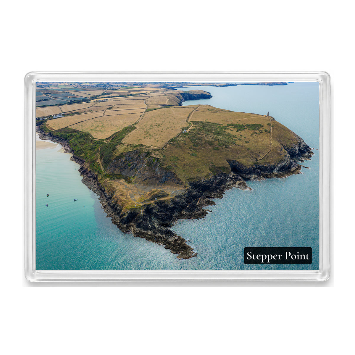 Stepper Point fridge magnet showing the daymark above rocky cliffs with turquoise water and Harlyn Bay and Trevose Head beyond