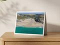 Premium A5 greeting card showing Porthtowan Beach at low tide with swimmers in turquoise water