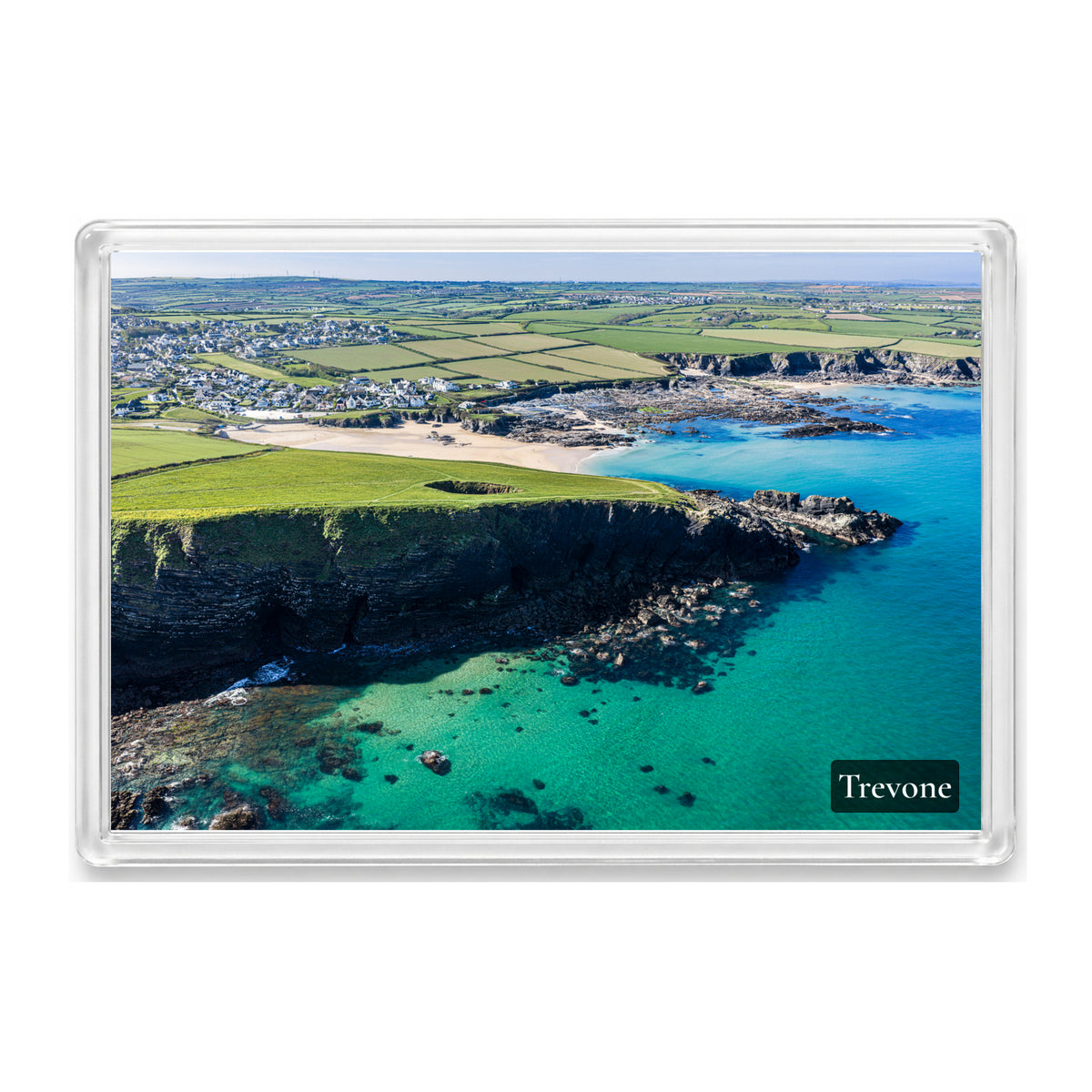 Trevone fridge magnet showing the Round Hole blowhole in the foreground with the bay beyond in calm, glassy spring colour