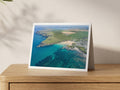 Premium A5 greeting card showing Trevone Bay with dark reef under clear turquoise summer water