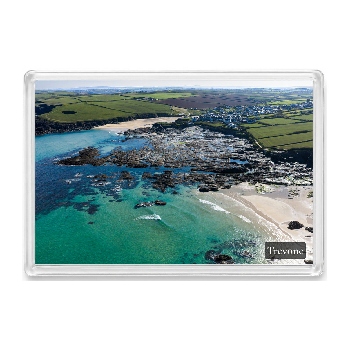 Trevone fridge magnet showing turquoise water around exposed rocks and sandbanks in Newtrain and Trevone Bay, with Round Hole