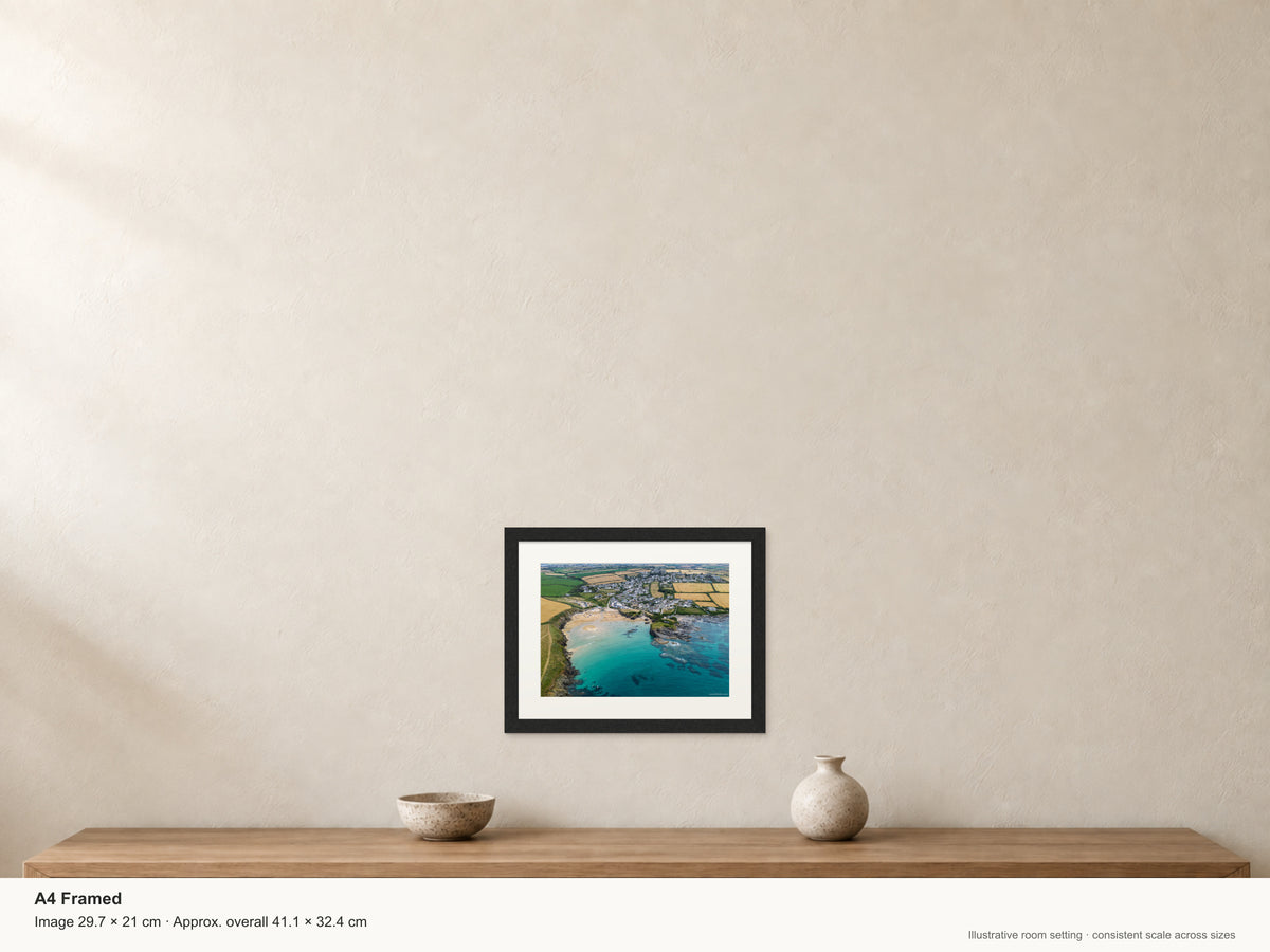 Trevone Bay — High Tide Summer Clarity — A4 framed, 22mm black stained frame and 35mm mount. Illustrative room scale and dimensions.