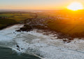 Golden Sunrise Over Trevone Bay — centred A-series photograph, unframed print preview.