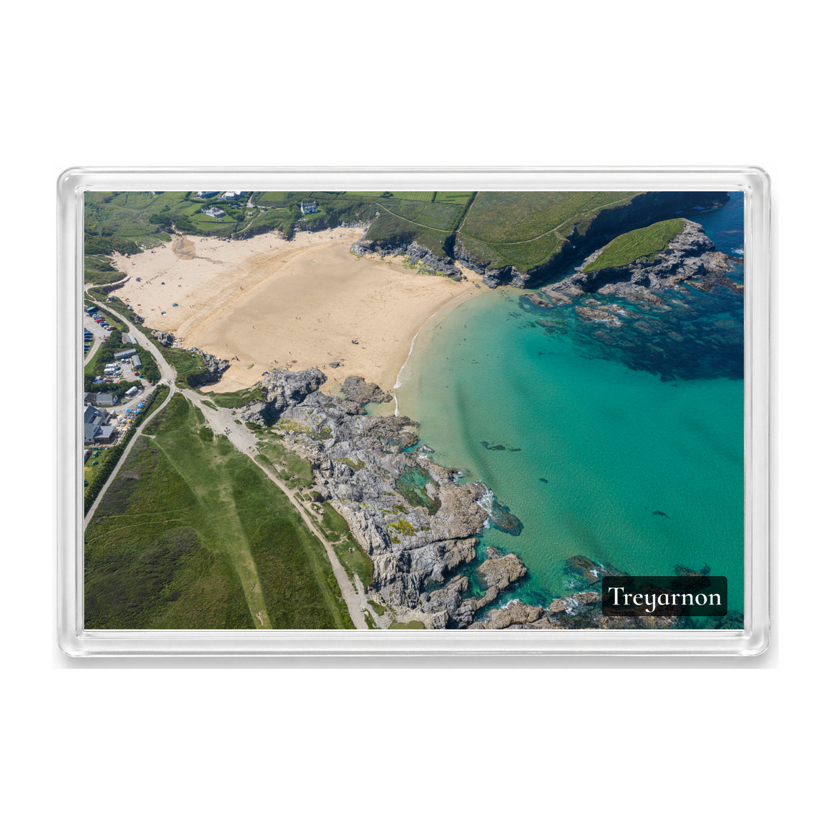 Treyarnon Bay fridge magnet showing clear turquoise water filling the bay at mid tide on a hot summer day
