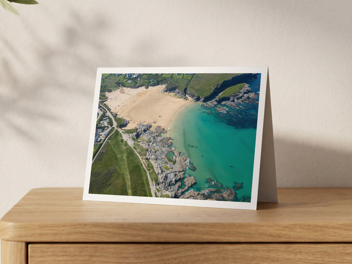 Premium A5 greeting card showing Treyarnon Bay at mid tide with clear turquoise water and rocks