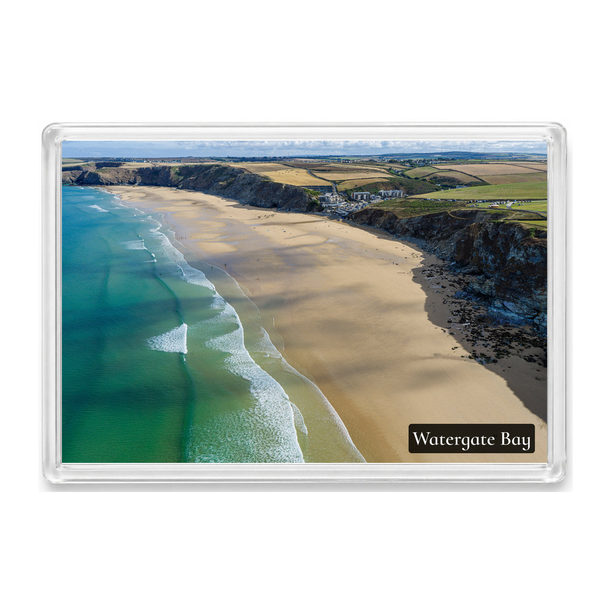 Watergate Bay fridge magnet showing turquoise water, expansive low-tide sand and dark cliffs