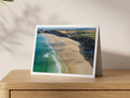 Premium A5 greeting card showing Watergate Bay at low tide with turquoise water and dark cliffs