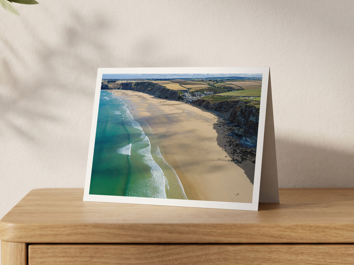 Premium A5 greeting card showing Watergate Bay at low tide with turquoise water and dark cliffs