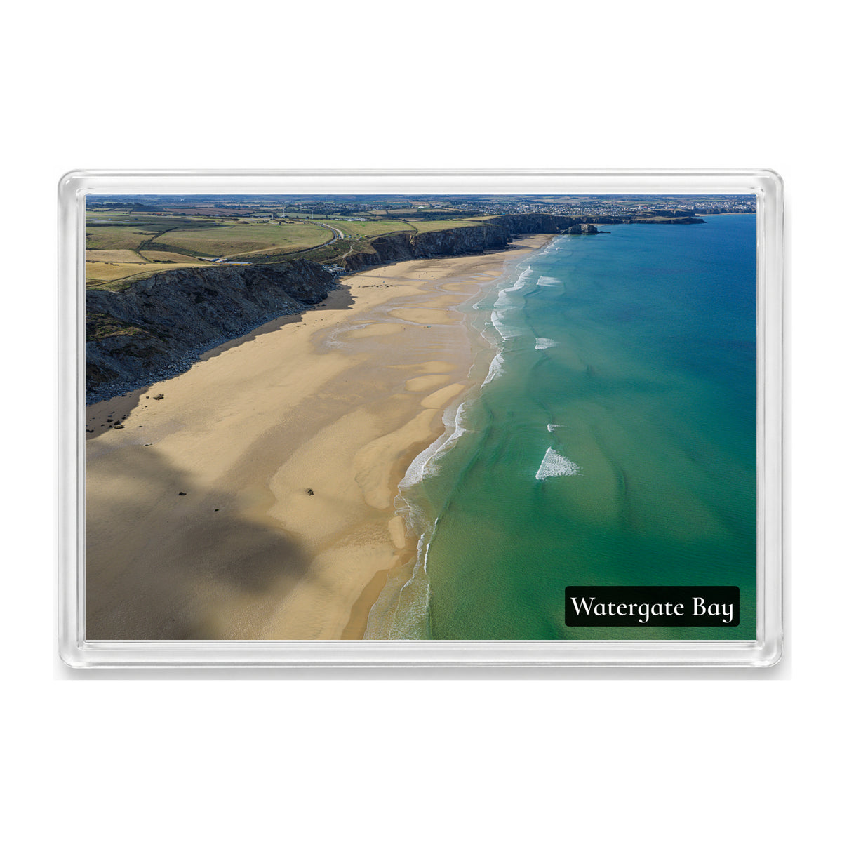 Watergate Bay fridge magnet showing turquoise water and broad pale sand beneath dark cliffs, looking south towards Newquay