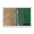Watergate Bay fridge magnet showing turquoise and emerald water meeting textured sand along lines of white surf, from directly above