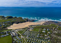 Treyarnon Bay — Bright Spring Blue — aerial Cornwall photography print