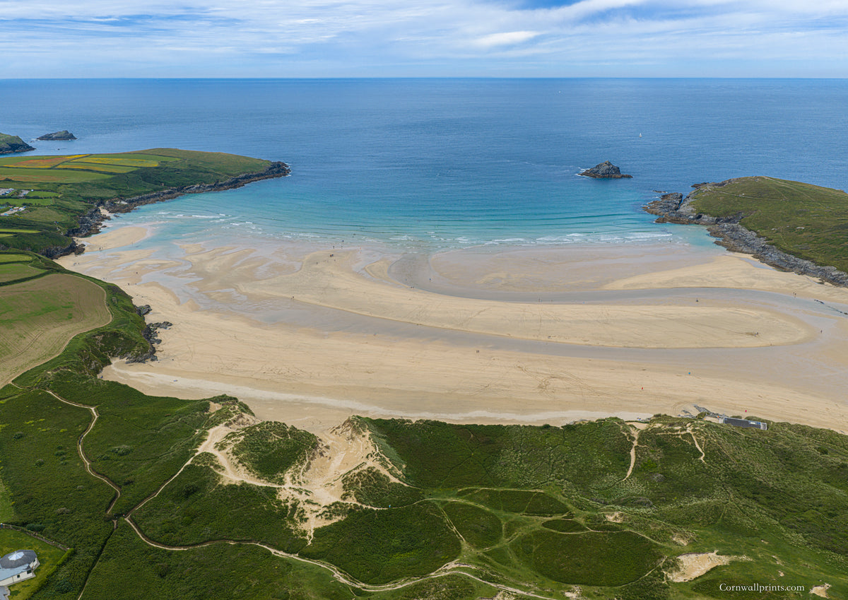 Aerial photograph of Crantock Bay, its dunes and turquoise water