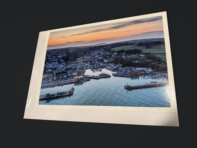 Padstow Harbour greeting card with its white envelope in a clear sleeve